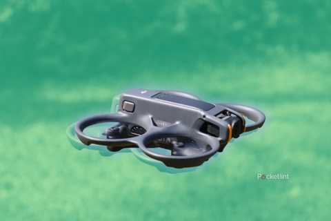 The DJI Avata 2 in flight against a green background