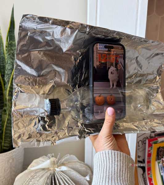 Aluminum foil with an iPhone. 