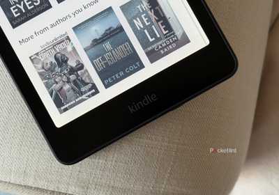 Kindle e-reader on a couch.