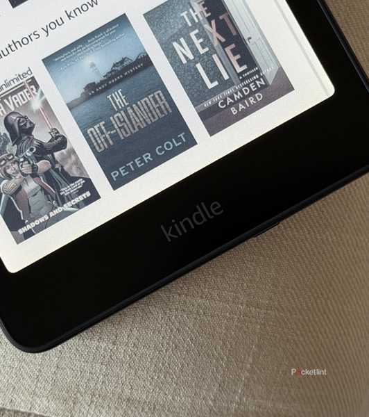 Kindle e-reader on a couch.