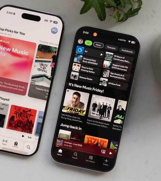 Apple Music and Spotify open on iPhones