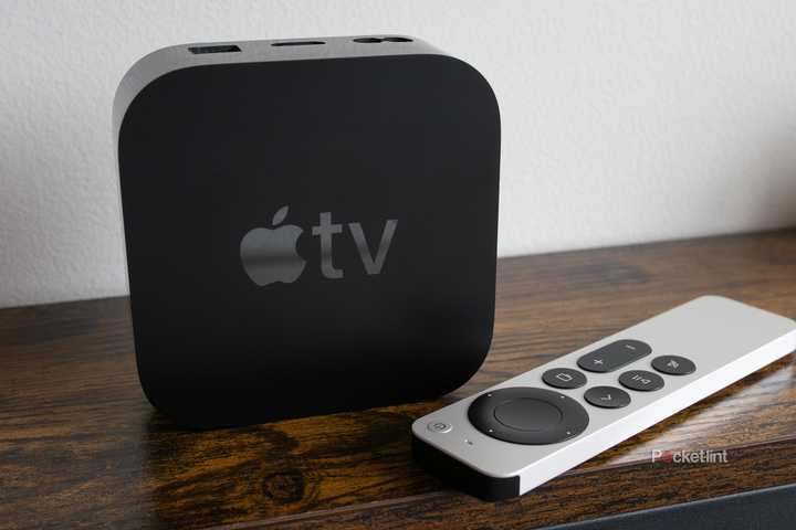 The Apple TV 4K sitting on a shelf 
