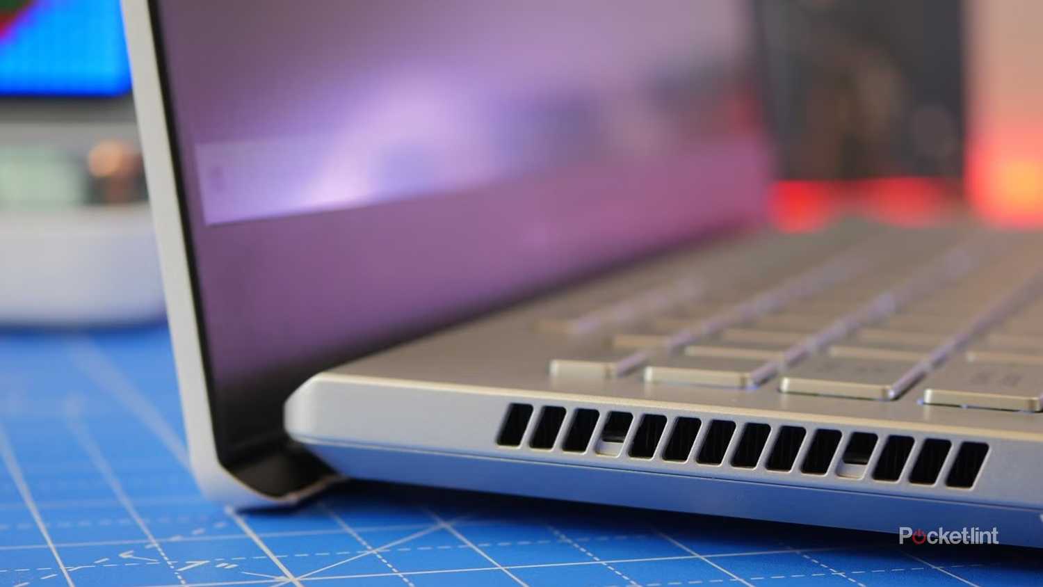 A side view of an ASUS G14 gaming laptop.