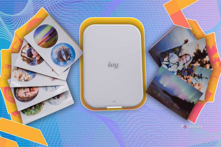 Canon Ivy 2 printer with photos beside it