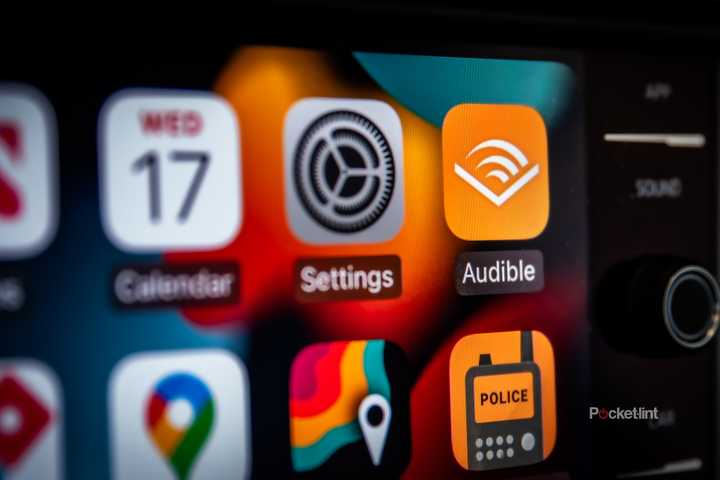 A still photo of the Apple CarPlay screen with the Audible app in focus. 