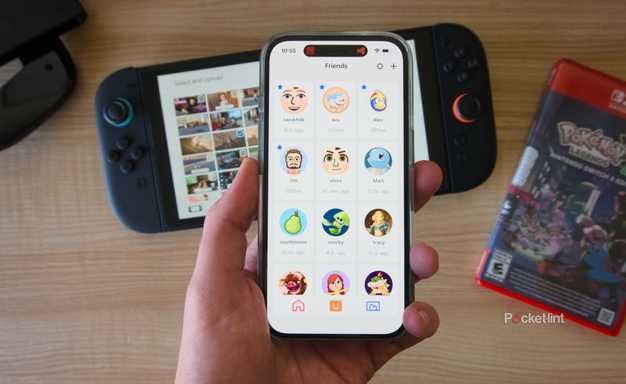 A hand holding an iPhone displaying the friends list in the Nintendo Switch App.