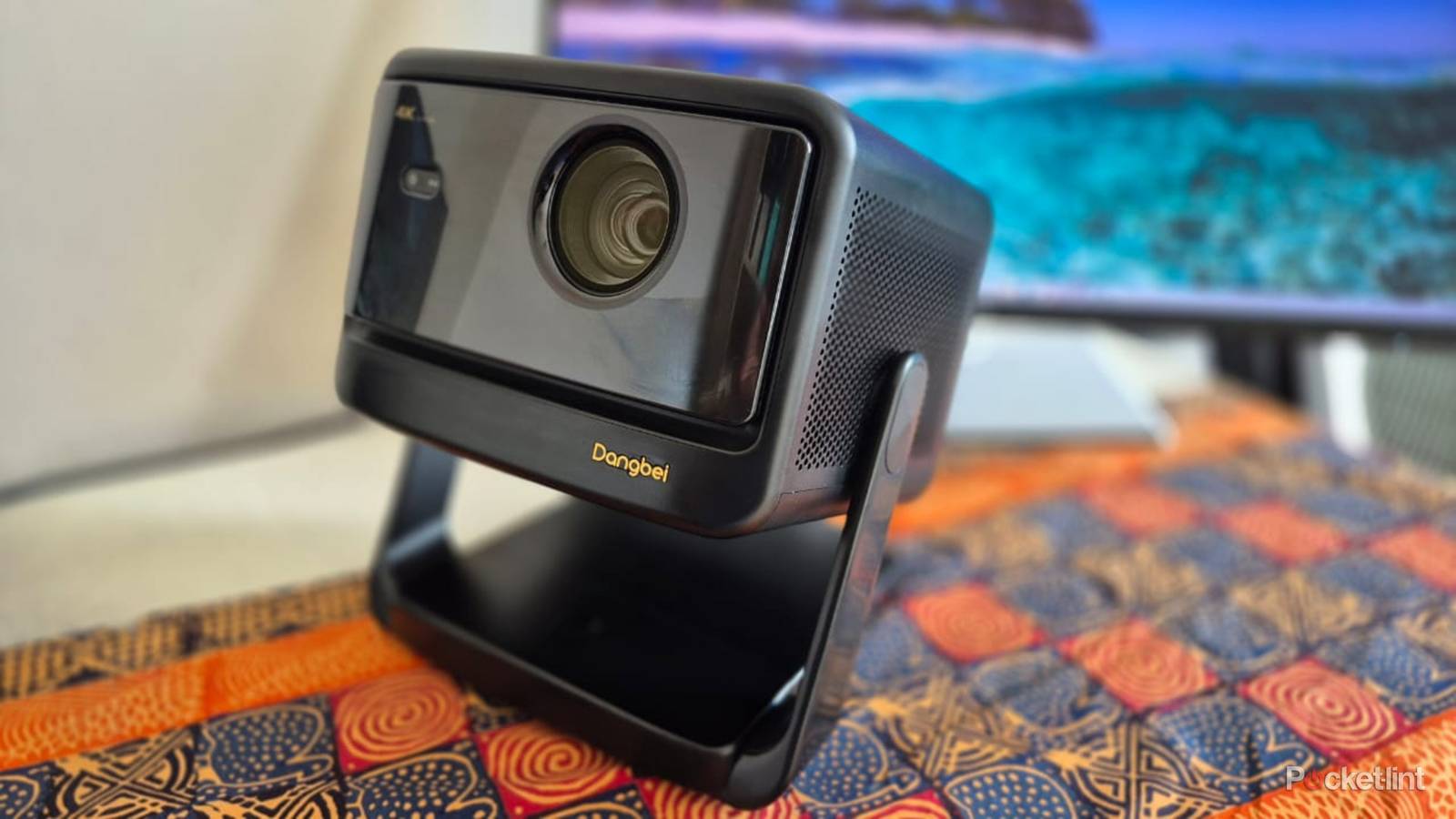 Dangbei DBOX02 Pro Projector on a table. 