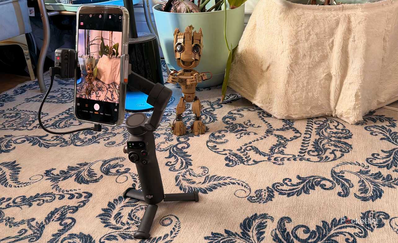 The DJI Osmo 7pm Gimbal taking a picture of Baby Groot. 