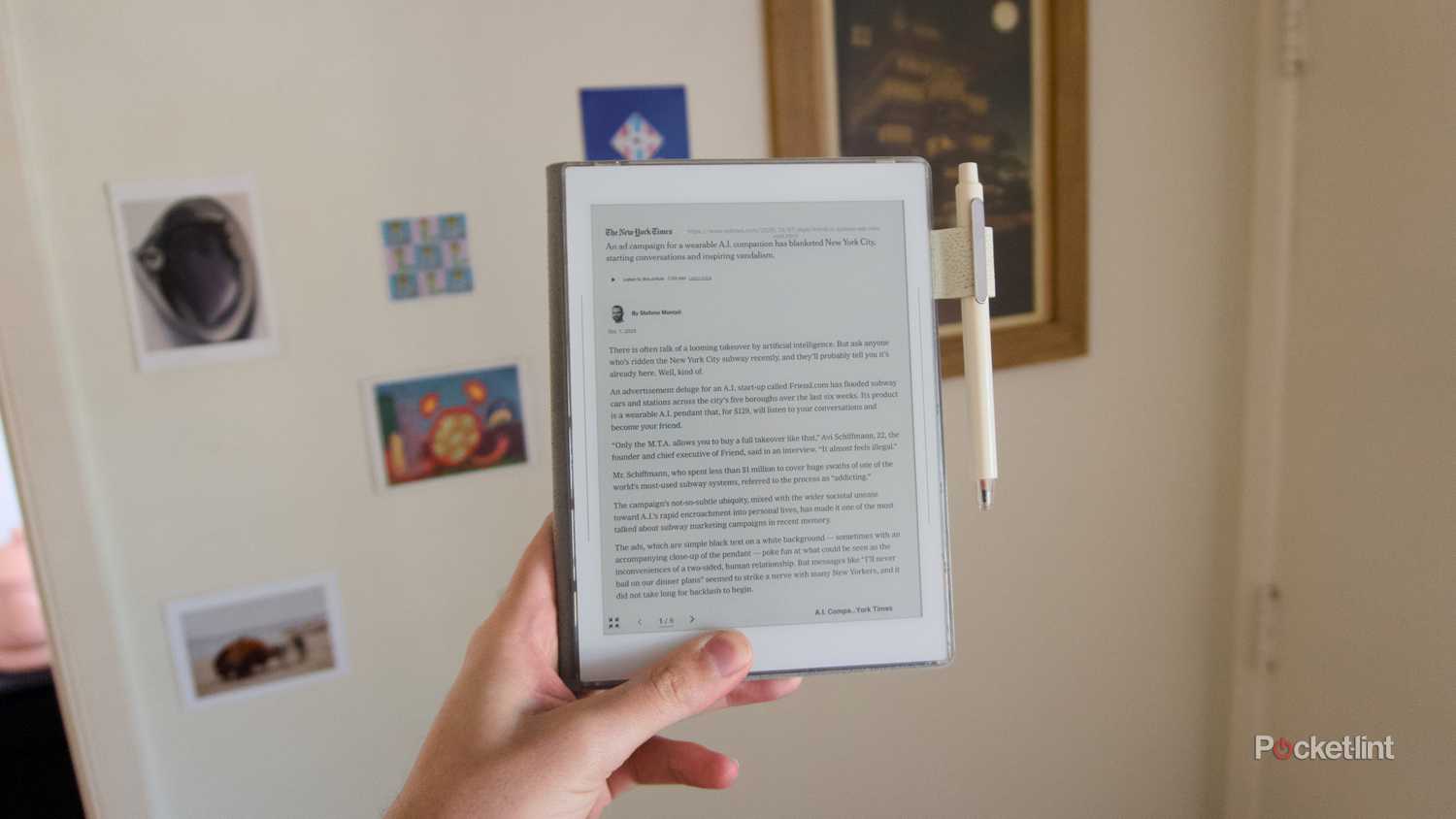 A hand holding a Supernote Nomad displaying an imported article.