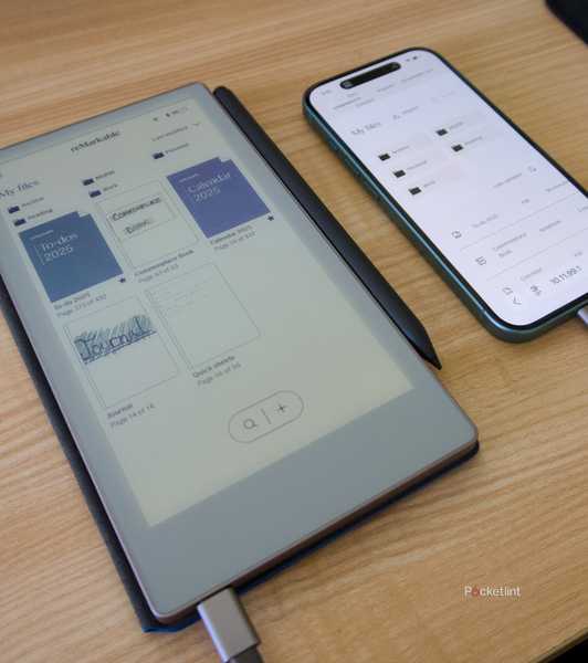 A reMarkable Paper Pro Move connected to an iPhone 16 with a USB-C cable.