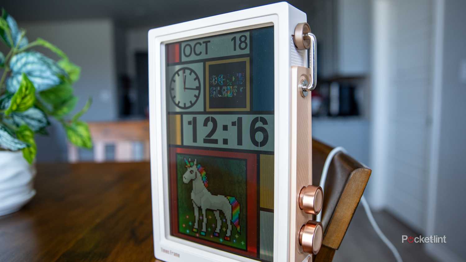 A still photo of a Divoom Times Frame sitting on a table