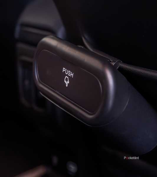 A still photo of the Accor car trash can in the back seat of a Jeep. 