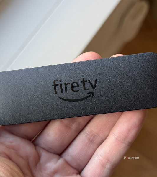 Person holding Amazon Fire TV Stick 4K Max.