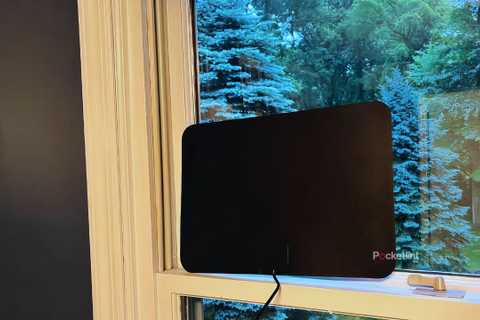 A Gesobyte digital TV antenna mounted in a window.