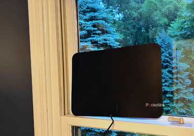 A Gesobyte digital TV antenna mounted in a window.