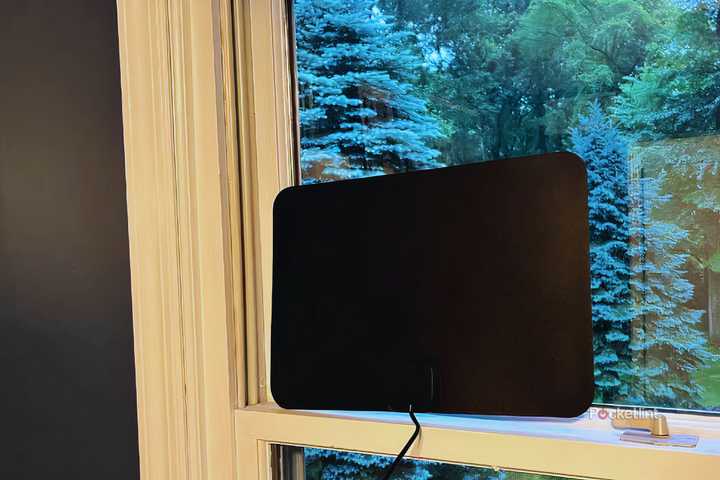 A Gesobyte digital TV antenna mounted in a window.