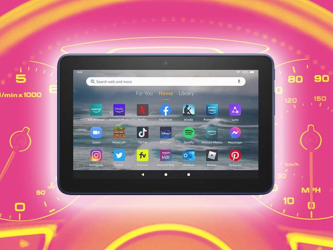 Amazon Fire tablet in the center of a pink, yellow, speedometer background
