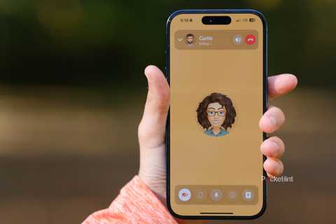 A hand holds an iPhone with a Snapchat video call.