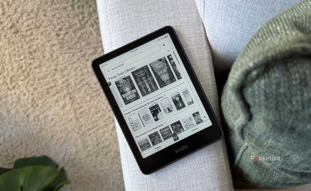 A Kindle Paperwhite on a sofa. 