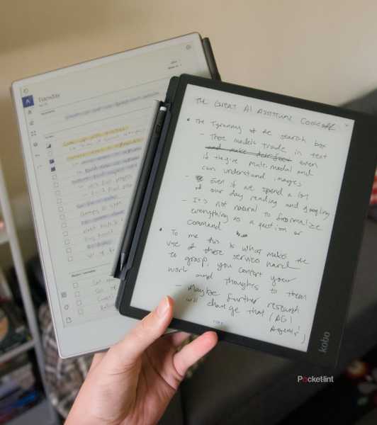 A hand holding a Kobo Elipsa 2E on top of a reMarkable Paper Pro.