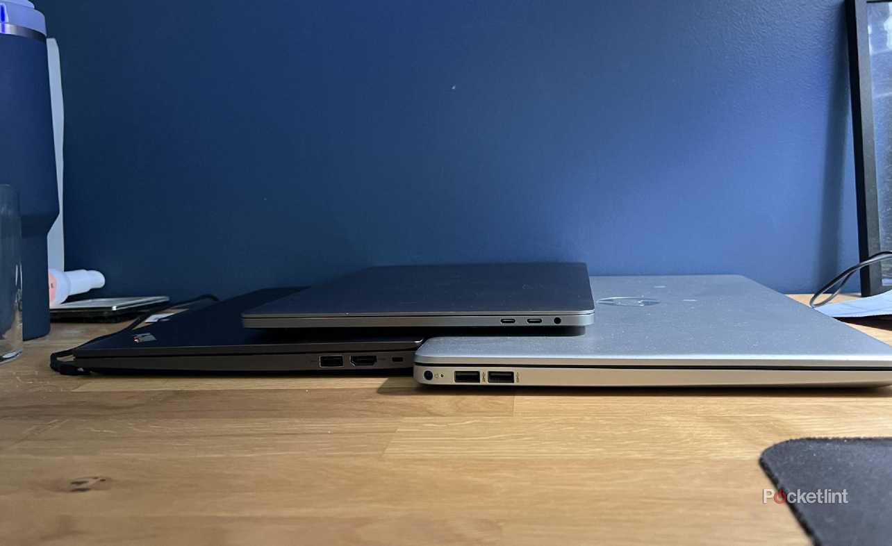 Lenovo, MacBook, and HP laptops showing their USB ports.