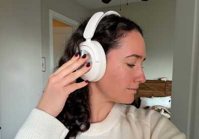A woman wearing headphones. 