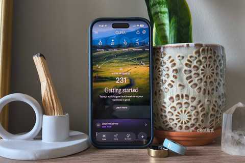 Oura app open on a propped up iPhone 16 Pro. 
