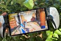 Astro Bot playing on a PlayStation Portal outside