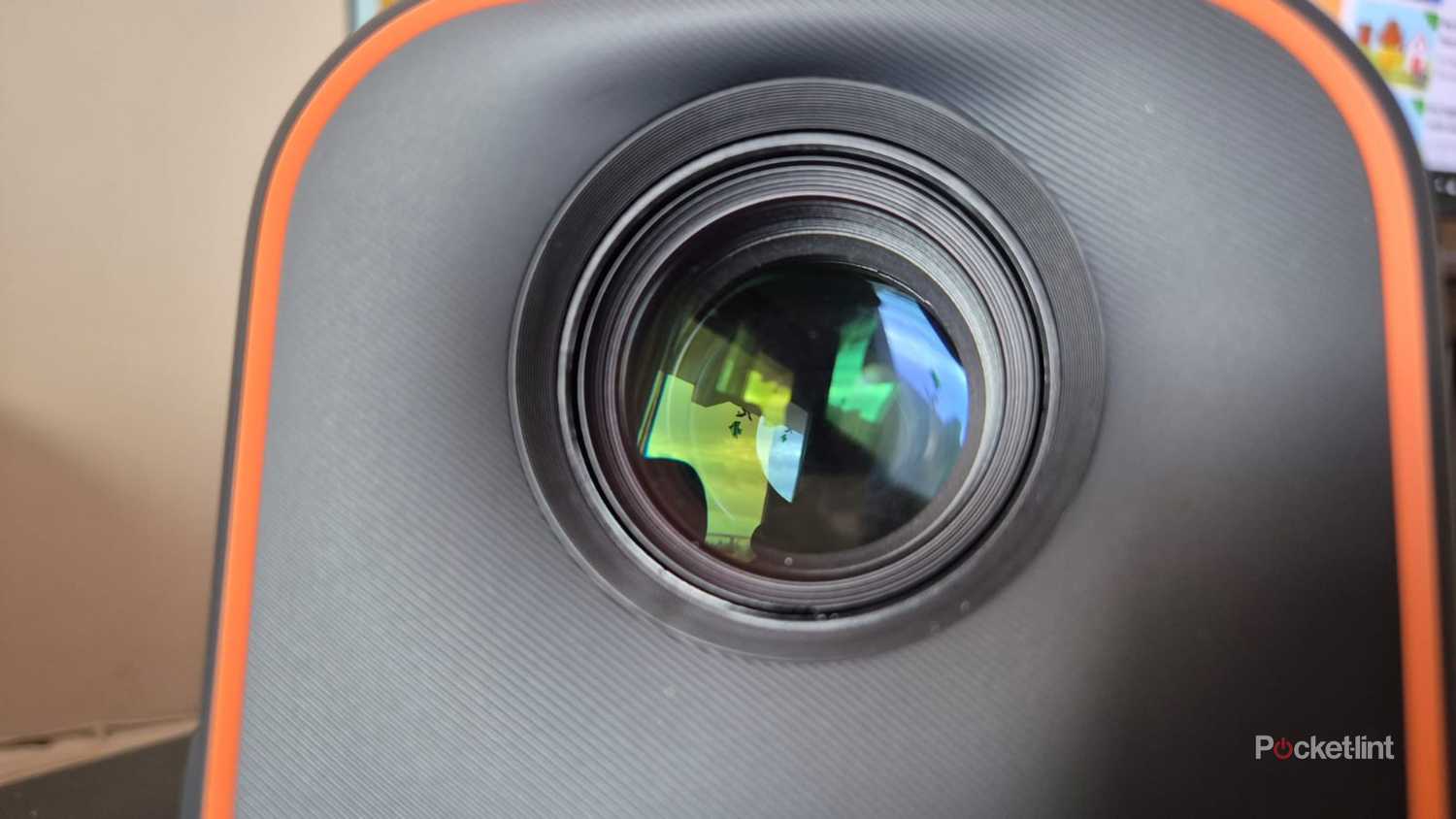 A close-up of a projector lens. 