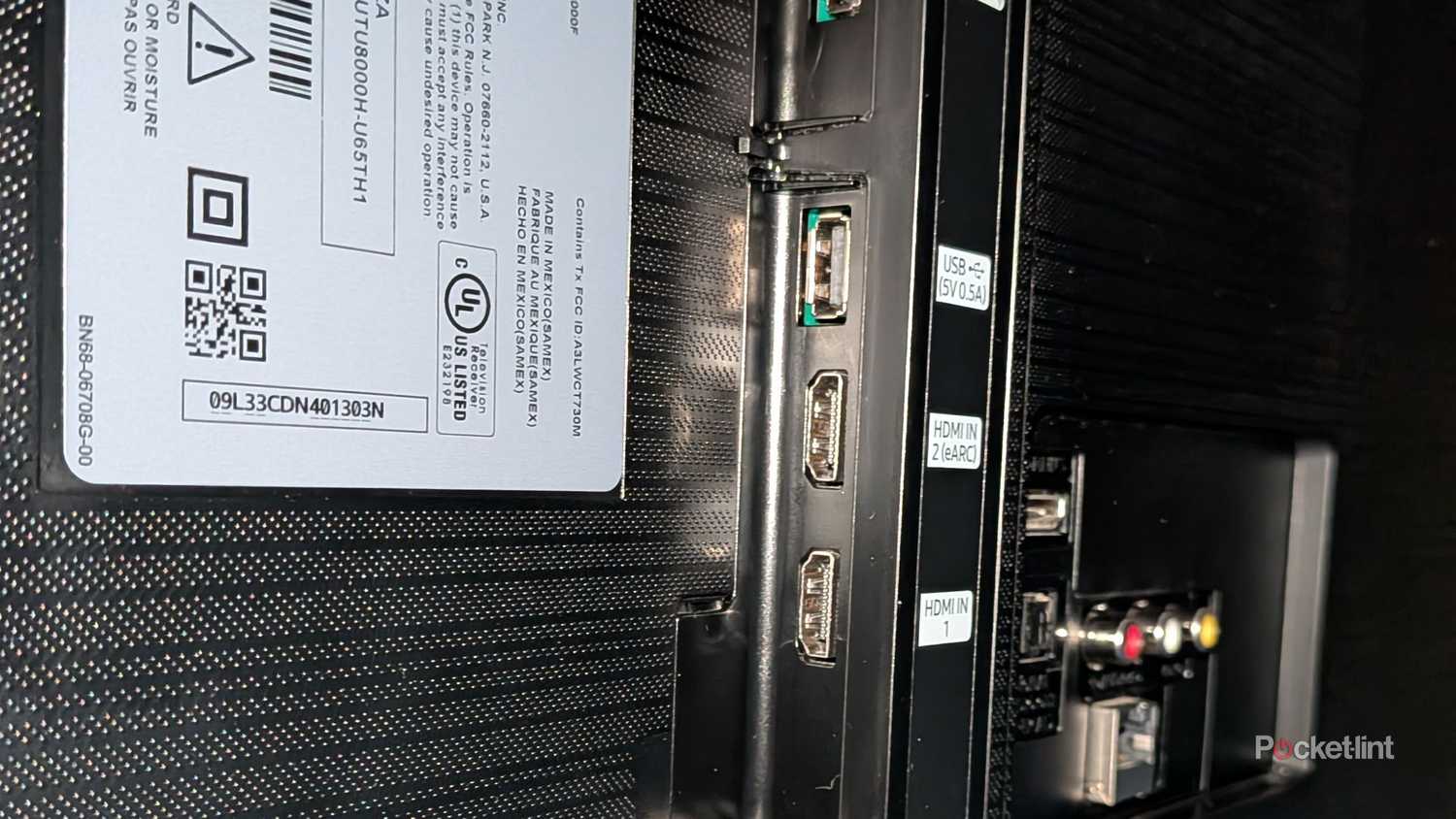 The back of a TV showing USB and HDMI ports.