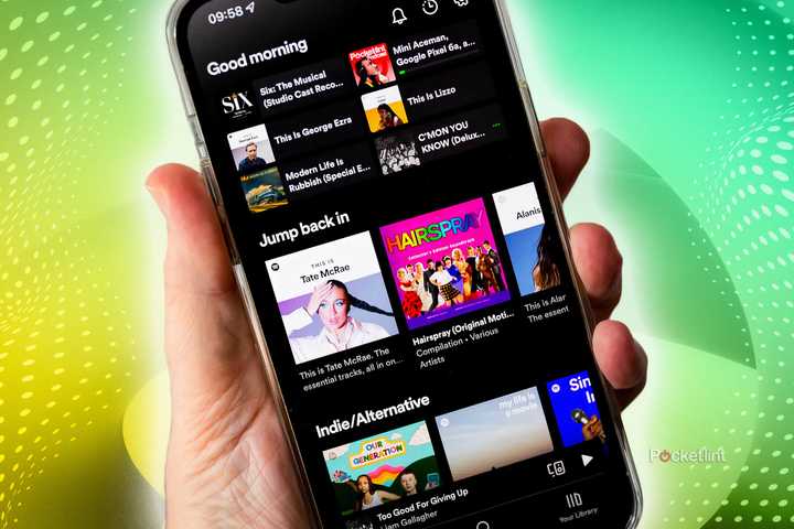 A phone with Spotify on it