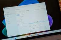 A Windows 11 PC with Task Manager running in a window.