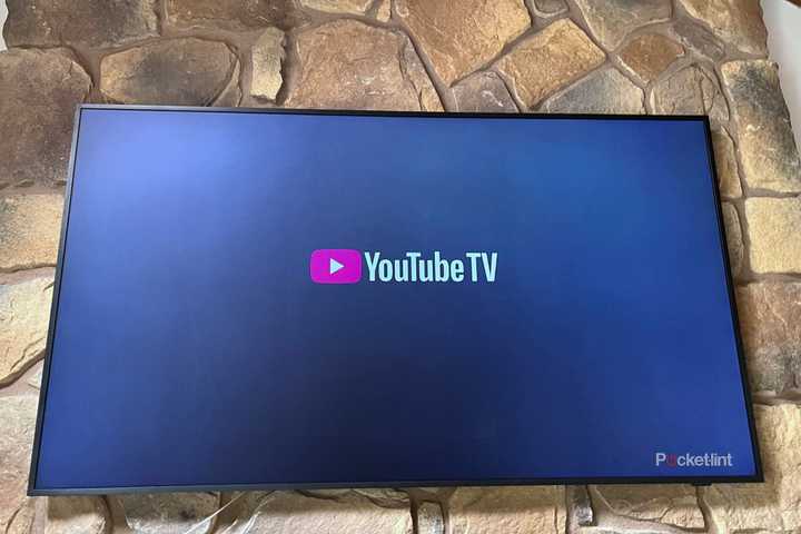 YouTube TV on a mounted TV. 