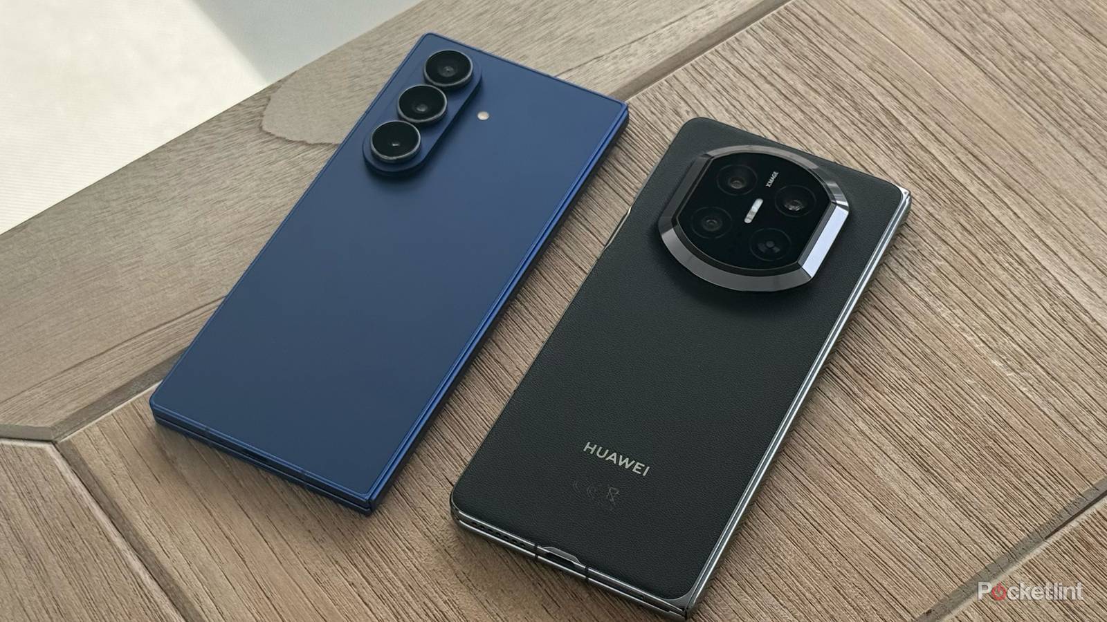 Galaxy Z Fold 7 and Huawei Mate X7 next to each other on a table